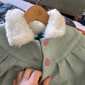 Baby blue, pink button. Size 2 girls coat